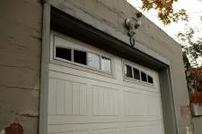 What to Do When Your Garage Door Gets Stuck Halfway