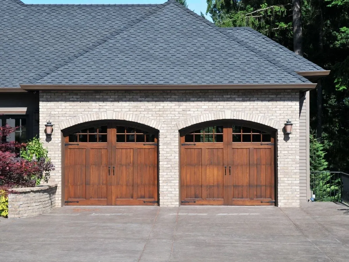 Steel vs. Wood Garage Doors: Pros and Cons for Longevity